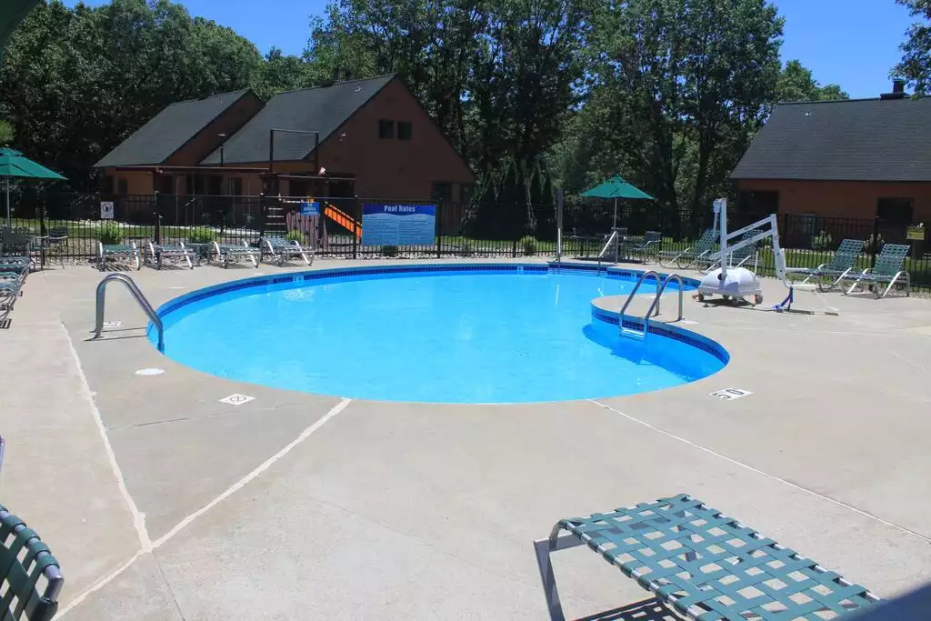 This beautiful kidney shaped pool is walking distance to the cabin you are staying in. Don't forget 6 pool towels are included in your cabin. With plenty of space for sunning and fun, you could spend all day here! This beautiful kidney shaped pool is walking distance to the cabin you are staying in. Don't forget 6 pool towels are included in your cabin. With plenty of space for sunning and fun, you could spend all day here! - Entire Cabin 1 Wisc Dells 3 Beds(2Bedrooms) 2Baths - 63 Christmas Mountain Road