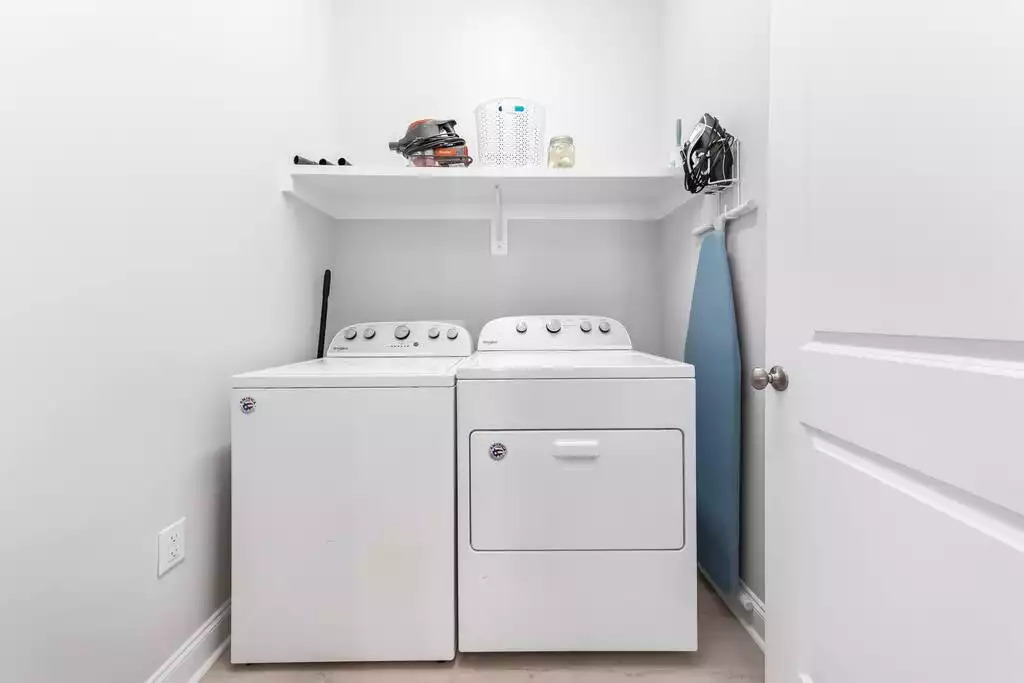 The laundry room comes complete with full size washer and dryer as well as iron and ironing board! Although I think it's against the rules to iron on vacation! ;) The laundry room comes complete with full size washer and dryer as well as iron and ironing board! Although I think it's against the rules to iron on vacation! ;) - Shipwrecked Beach House Orange Beach, Alabama - Orange Beach