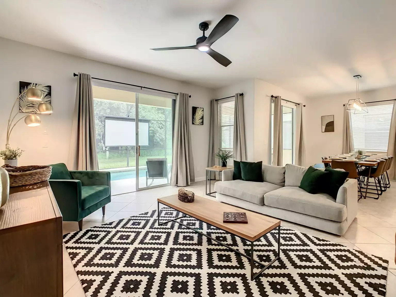 Settle in on the couch while watching the kids swim in the pool. Settle in on the couch while watching the kids swim in the pool. - Immersive Themes* Outdoor Pool & Movie* 5mi Disney - Kissimmee