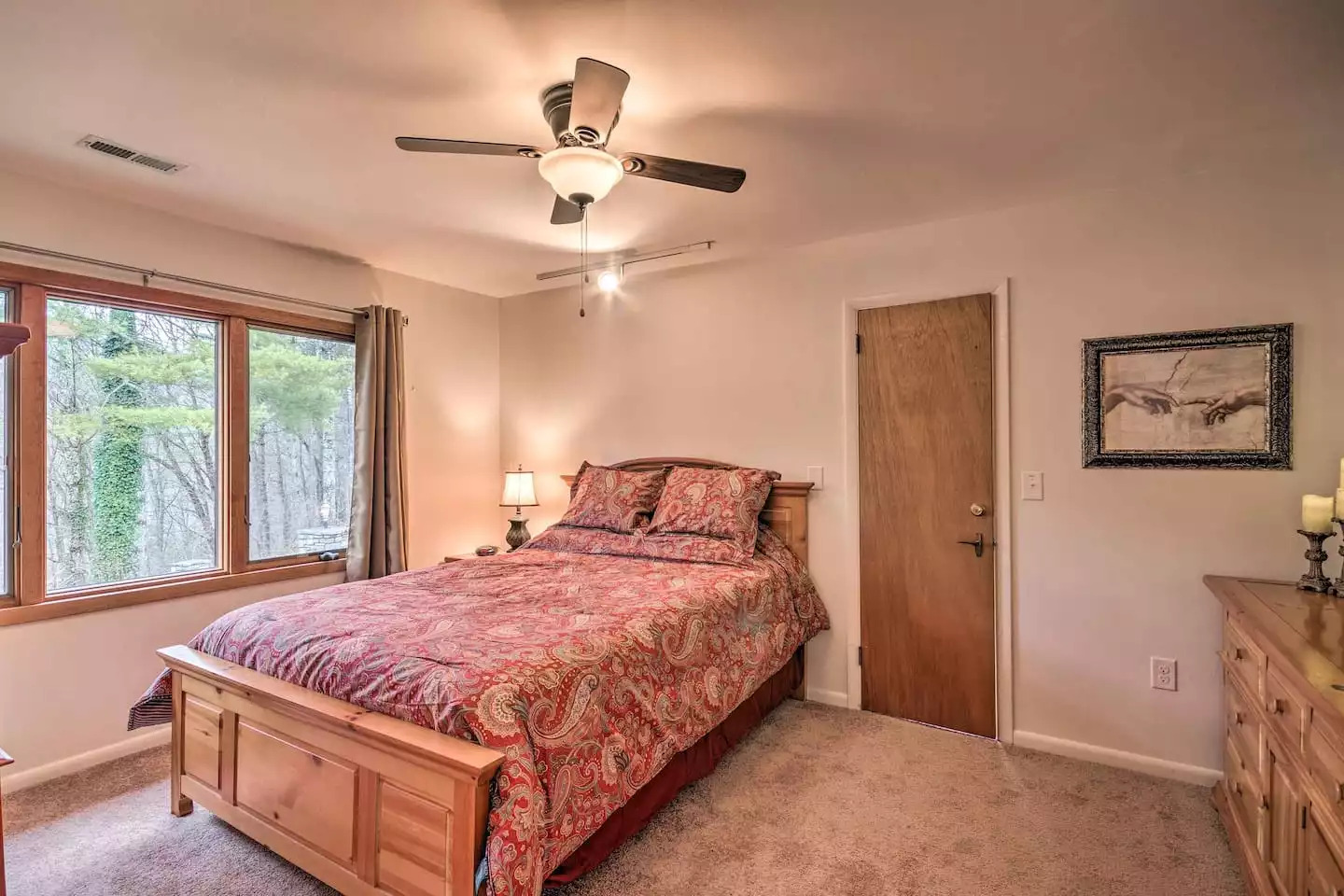 Wake to forest views after a restful night's sleep in this queen bed. Wake to forest views after a restful night's sleep in this queen bed. - Leaping Fawn Lodge - Waynesville