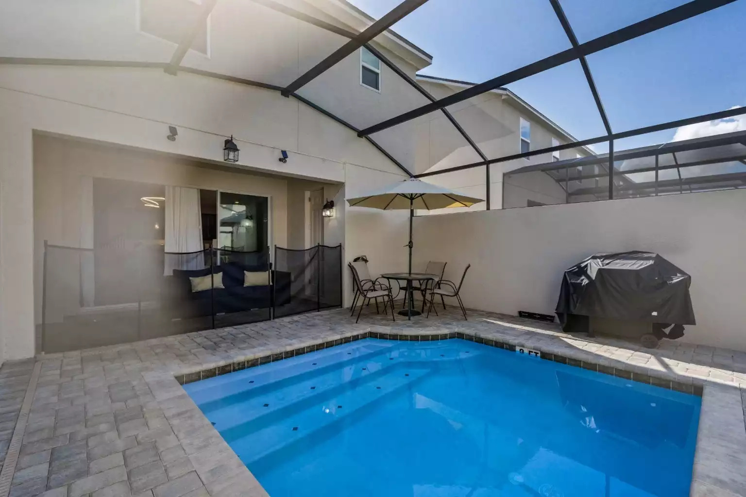 Private heated pool with patio furniture, outdoor couch, baby gate and BBQ grill. Private heated pool with patio furniture, outdoor couch, baby gate and BBQ grill. - Luxury Vacation Home Minutes From Disney World - Kissimmee