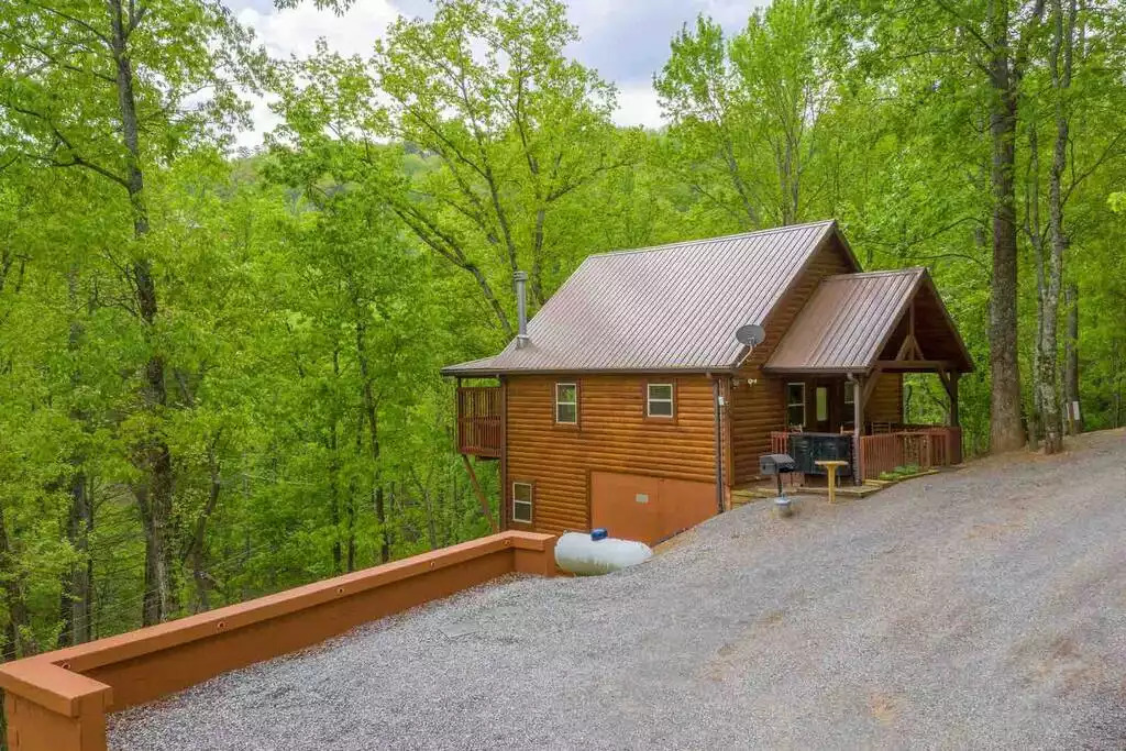 Parking space for three vehicles Parking space for three vehicles - Secluded Luxury 2 Bdrm Cabin w/Theatre Room & Pond - Sevierville