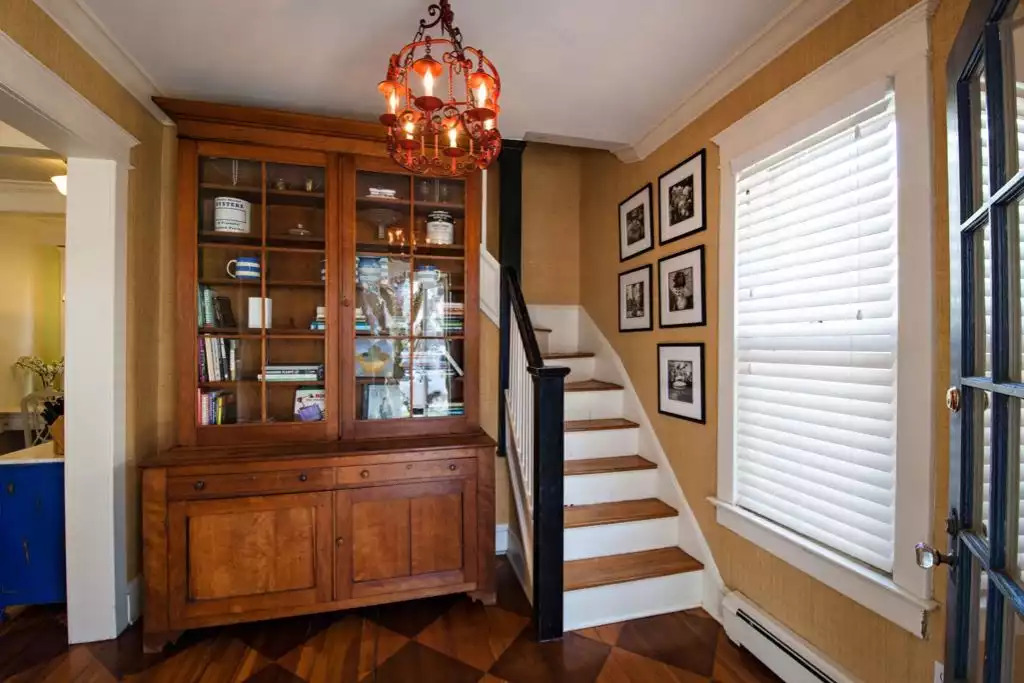 Chadwick Cottage Vacation Rental Home. Rear foyer with back staircase and antique pine cabinet with original had poured, wavy glass. Vacation Rentals Asbury Park. Vacation Rentals Ocean Grove. Chadwick Cottage Vacation Rental Home. Rear foyer with back staircase and antique pine cabinet with original had poured, wavy glass. Vacation Rentals Asbury Park. Vacation Rentals Ocean Grove. - Chadwick Cottage Vacation Rental Home - Ocean Grove