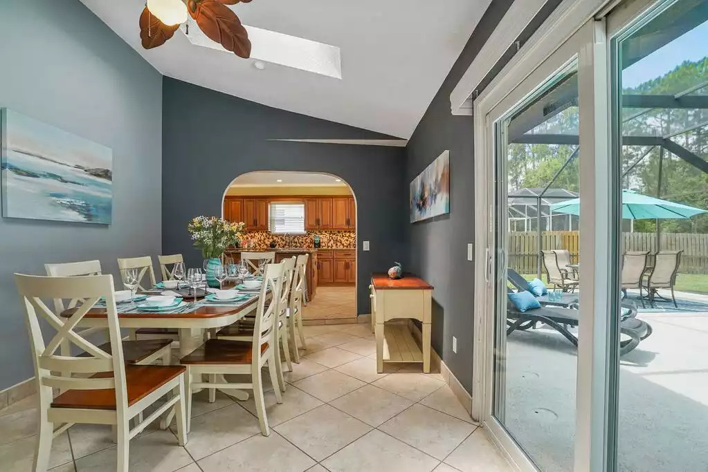 Farmhouse-style dining room table, seating for 8 people. Farmhouse-style dining room table, seating for 8 people. - Heated Saltwater Pool*Harry Potter*Fire Pit*BBQ*EV - St. Augustine