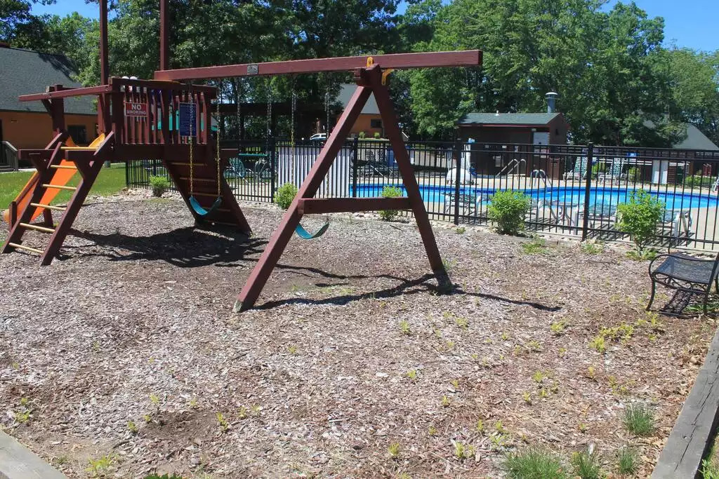 Play area just beyond the pool allows for another outlet for this kids to release some energy! There are multiple play areas on the property. We hope you can take some time to enjoy the gorgeous scenery on the property during your stay. Play area just beyond the pool allows for another outlet for this kids to release some energy! There are multiple play areas on the property. We hope you can take some time to enjoy the gorgeous scenery on the property during your stay. - Entire Cabin 1 Wisc Dells 3 Beds(2Bedrooms) 2Baths - 63 Christmas Mountain Road