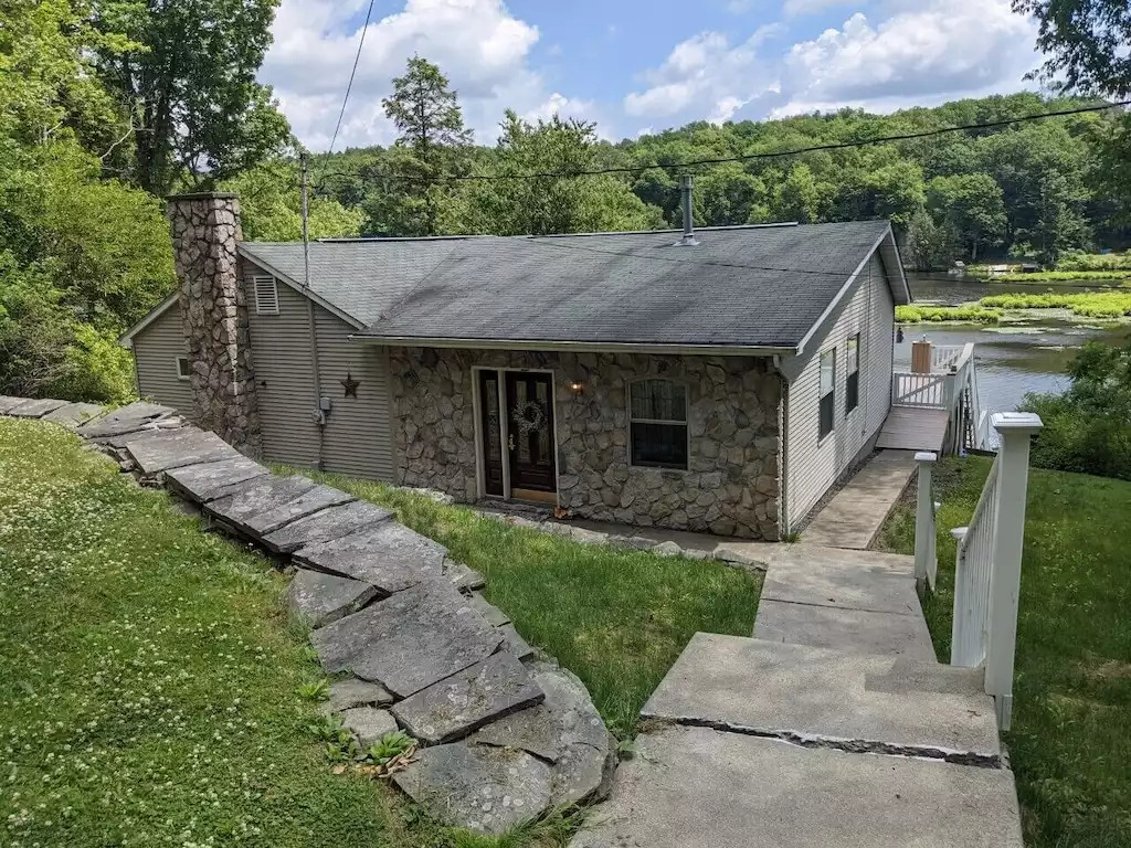 3 off street parking spaces located in front of the house. 3 off street parking spaces located in front of the house. - Legacy Lake House - Kingsley