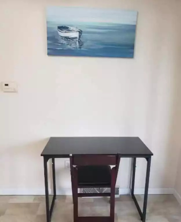 We offer two desks and chairs, great for laptop gaming and working. We offer two desks and chairs, great for laptop gaming and working. - Legacy Lake House - Kingsley