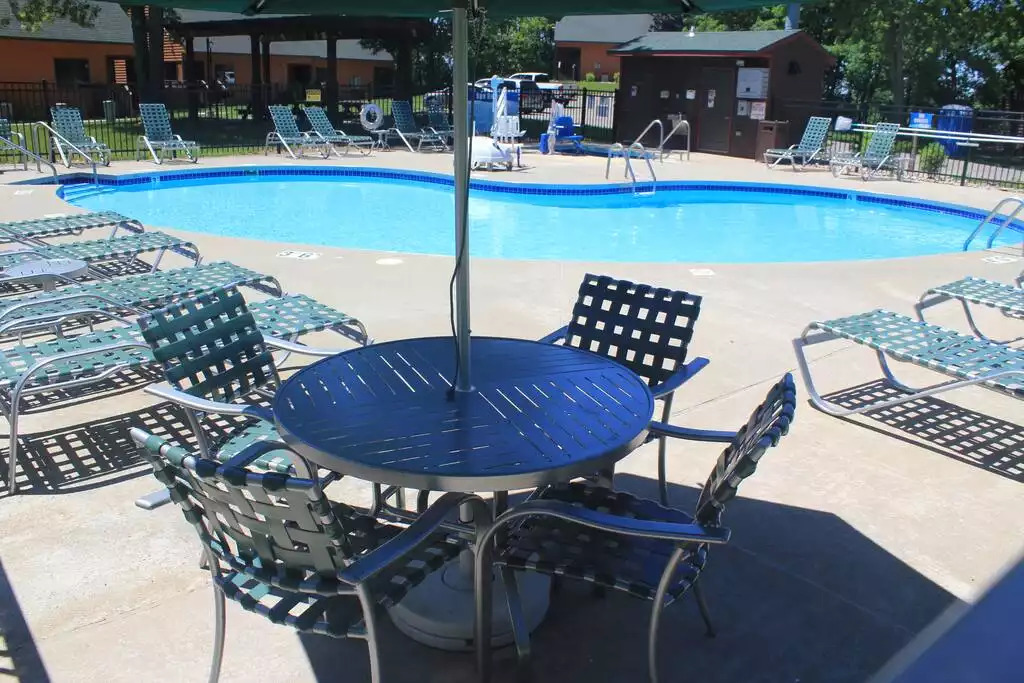 With plenty of seating around the pool, there is room to watch the kids swim, or get a little sun. Outdoor pools are open 10 AM to 8 PM. This is one of four outdoor pools on the property. And the one closest to your cabin! With plenty of seating around the pool, there is room to watch the kids swim, or get a little sun. Outdoor pools are open 10 AM to 8 PM. This is one of four outdoor pools on the property. And the one closest to your cabin! - Entire Cabin 1 Wisc Dells 3 Beds(2Bedrooms) 2Baths - 63 Christmas Mountain Road