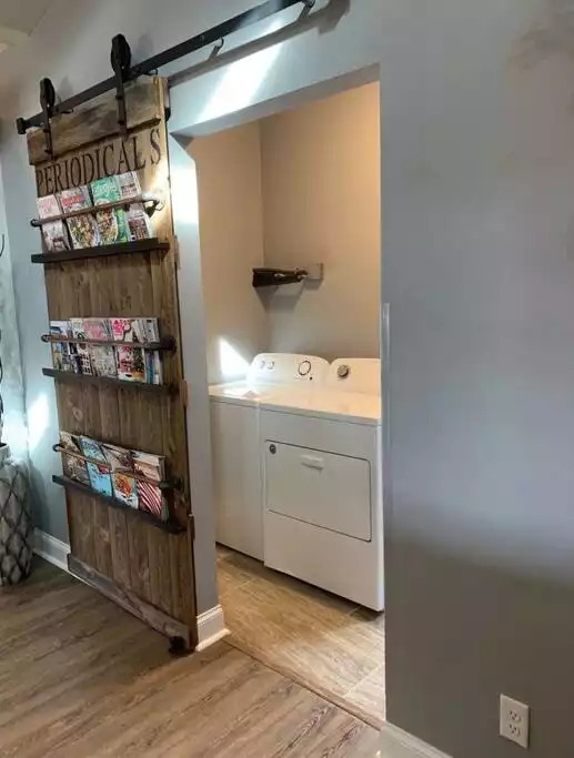 The laundry/utility room is cleverly camouflaged behind the barn door. The laundry/utility room is cleverly camouflaged behind the barn door. - Fox View Cottage - Rising Fawn