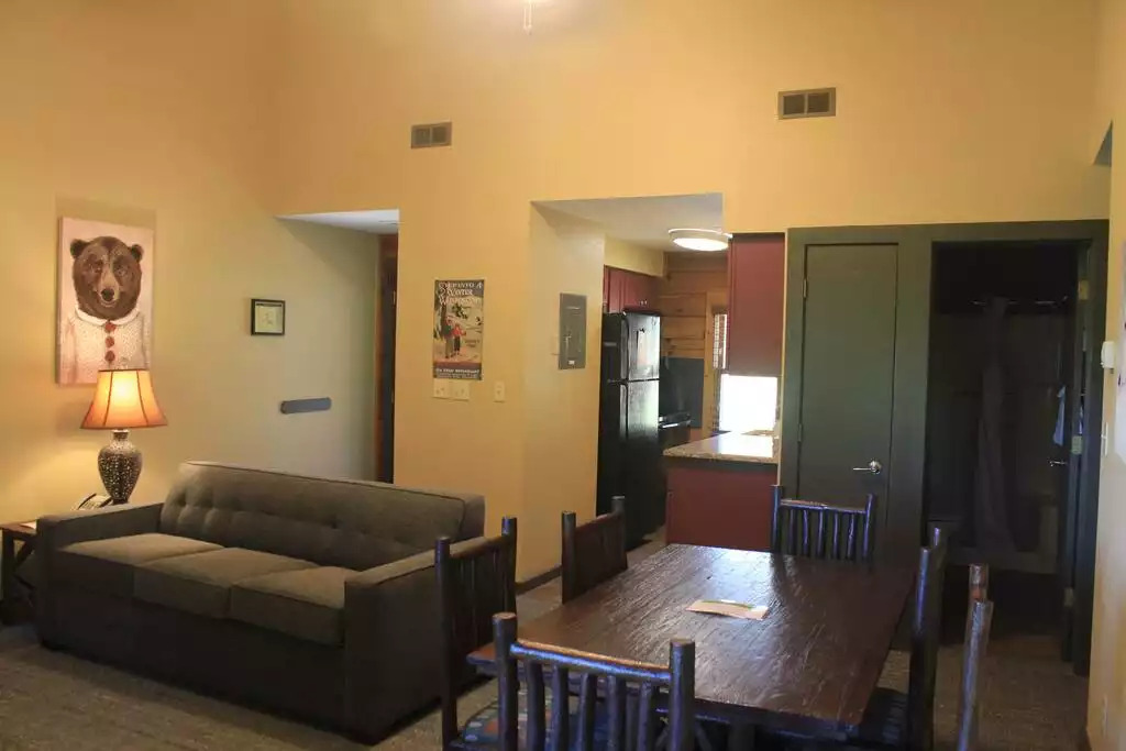 This open concept dining and living allows for nice family evenings and meals. Each unit includes gas fireplace, TV in all rooms, queen pull out sleeper sofa, free Wi-Fi, dining table, vaulted ceilings, central heat and AC with thermostat. This open concept dining and living allows for nice family evenings and meals. Each unit includes gas fireplace, TV in all rooms, queen pull out sleeper sofa, free Wi-Fi, dining table, vaulted ceilings, central heat and AC with thermostat. - Entire Cabin 3 Wisc Dells 3 Beds(2Bedrooms) 2Baths - Wisconsin Dells