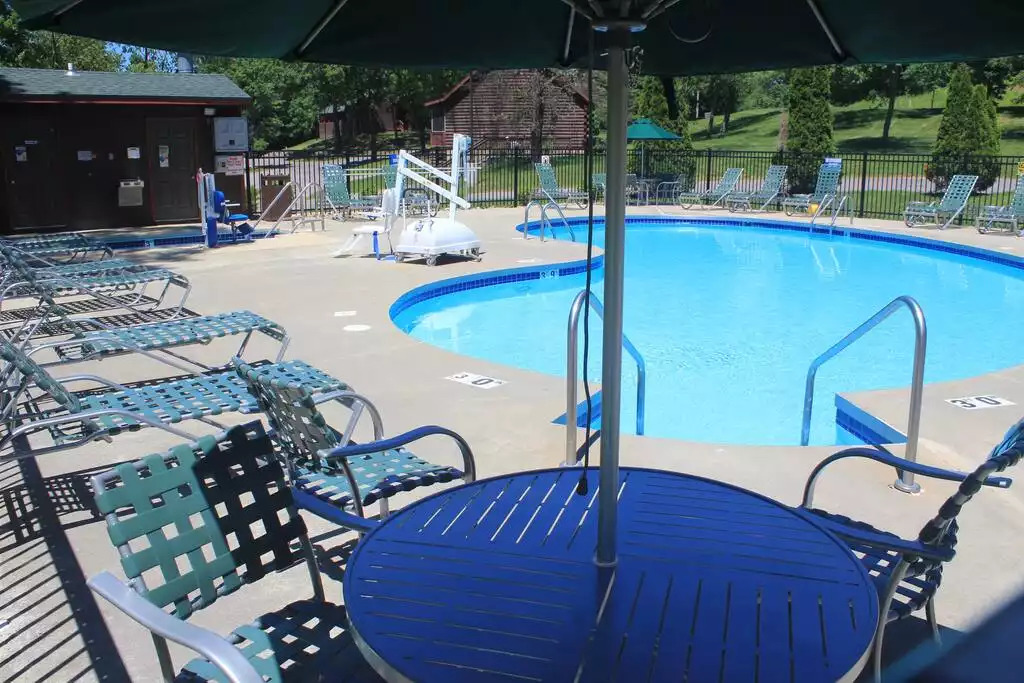 Come take a seat by the pool! Outdoor pools are open 10 AM to 8 PM. This is one of four outdoor pools on the property, and the one closest to your cabin! Pool towels are included for your use during your stay. Come take a seat by the pool! Outdoor pools are open 10 AM to 8 PM. This is one of four outdoor pools on the property, and the one closest to your cabin! Pool towels are included for your use during your stay. - Entire Cabin 1 Wisc Dells 3 Beds(2Bedrooms) 2Baths - 63 Christmas Mountain Road
