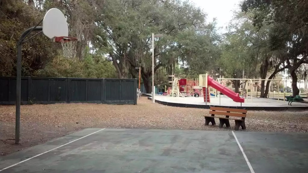 Play basketball while the kids are on the playground. Play basketball while the kids are on the playground. - HHI TIDE 21, Family Vacation Rental, HHB&T Resort - Hilton Head Island