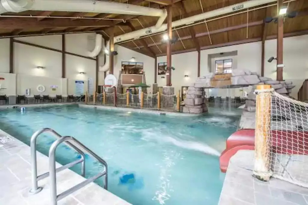 The indoor pool, located at the main check-in building is open year around! Open late into the evening, there is time for a swim after dinner at one of the local restaurants! Kid friendly and adult friendly, all ages will enjoy the indoor pool! The indoor pool, located at the main check-in building is open year around! Open late into the evening, there is time for a swim after dinner at one of the local restaurants! Kid friendly and adult friendly, all ages will enjoy the indoor pool! - Entire Cabin 1 Wisc Dells 3 Beds(2Bedrooms) 2Baths - 63 Christmas Mountain Road
