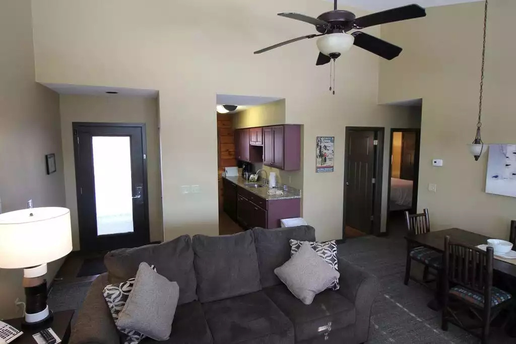 We can see the entry front door to the left. Next to the door is a small closet to hang up your jacket. The open concept of this space allows for visibility, good times and plenty of fun. Cathedral ceilings make the space feel more open. We can see the entry front door to the left. Next to the door is a small closet to hang up your jacket. The open concept of this space allows for visibility, good times and plenty of fun. Cathedral ceilings make the space feel more open. - Entire Cabin 1 Wisc Dells 3 Beds(2Bedrooms) 2Baths - 63 Christmas Mountain Road