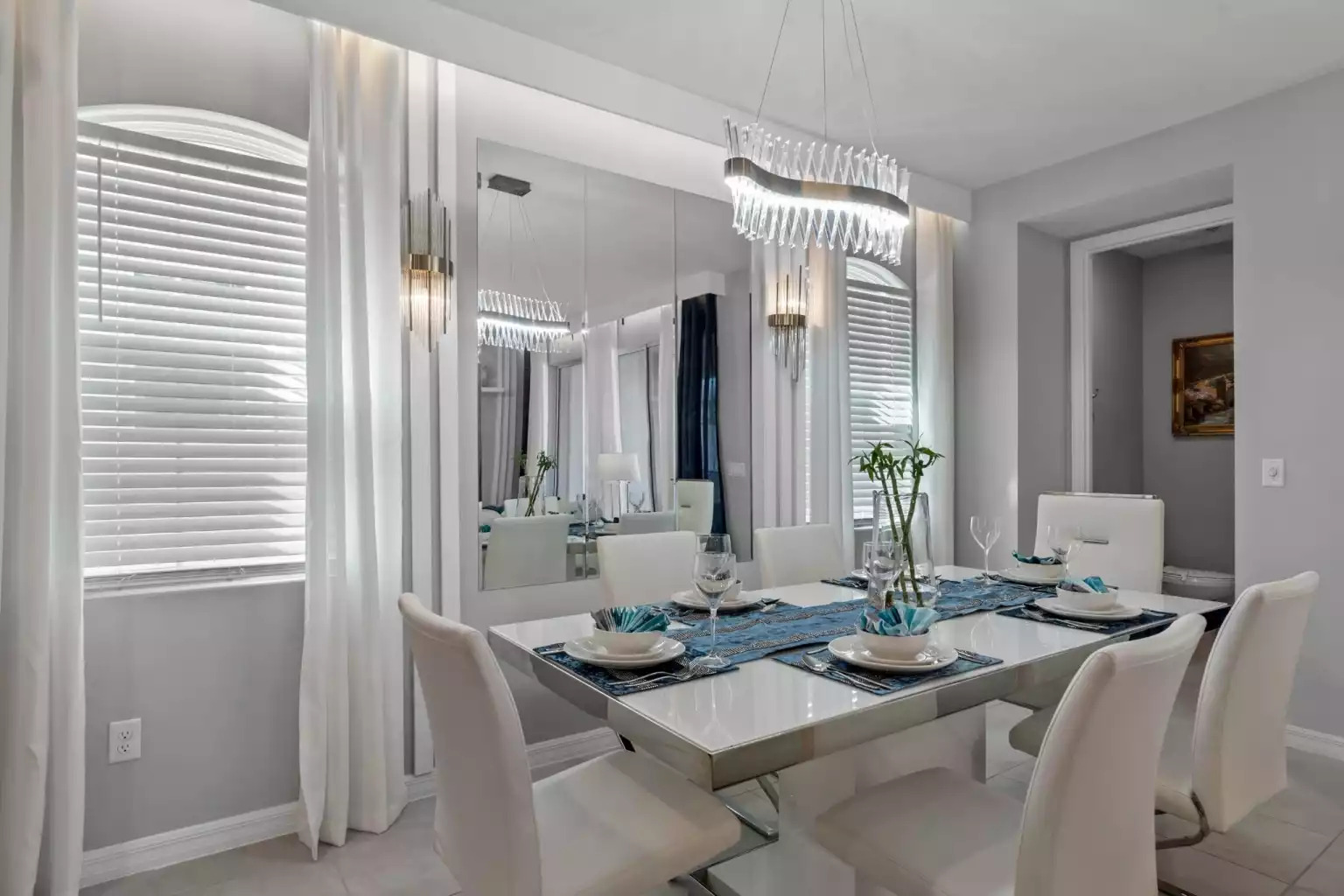 New modern and professionally decorated dining area with modern lighting. New modern and professionally decorated dining area with modern lighting. - Luxury Vacation Home Minutes From Disney World - Kissimmee