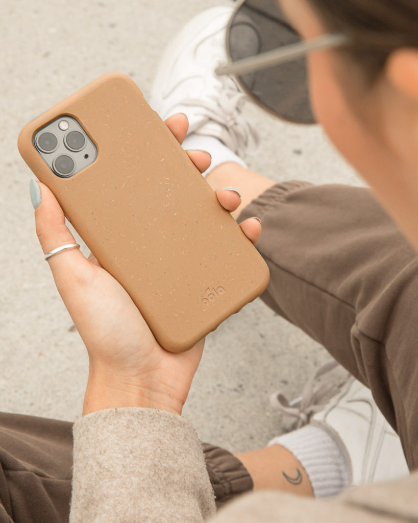 Girl holding phonecase