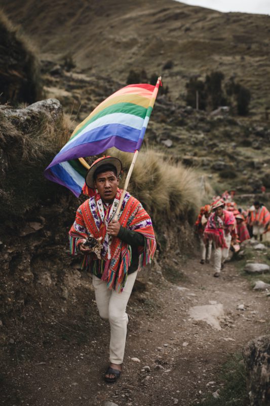 man with rainbow flag