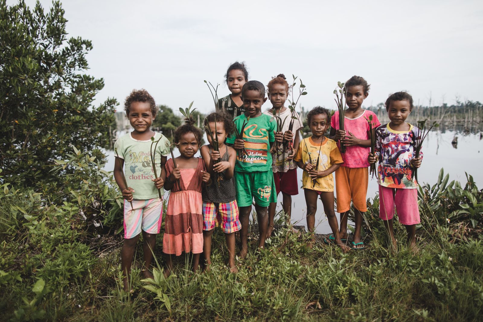 little kids with seedlings