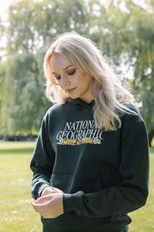 woman in national geographic sweater