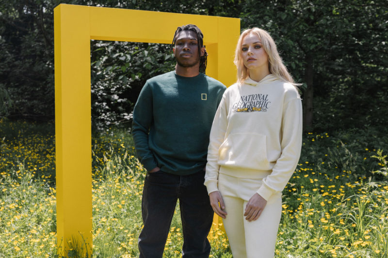 man and woman in national geographic sweater