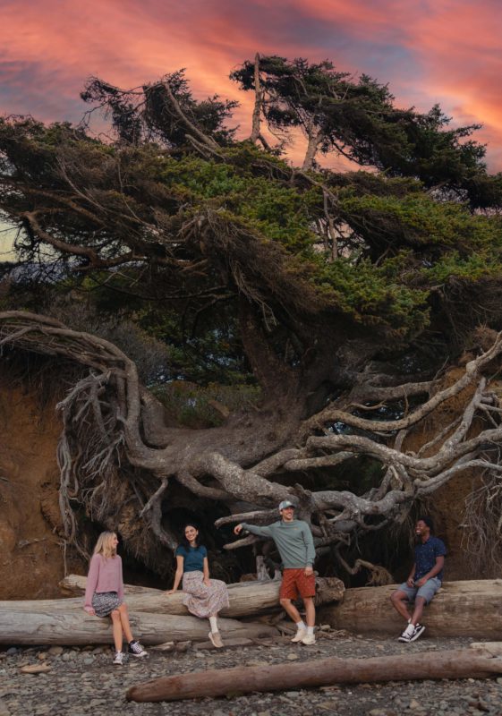 Group of friends wearing tentree Spring 2025 at the Tree of Life, Forks, Washington