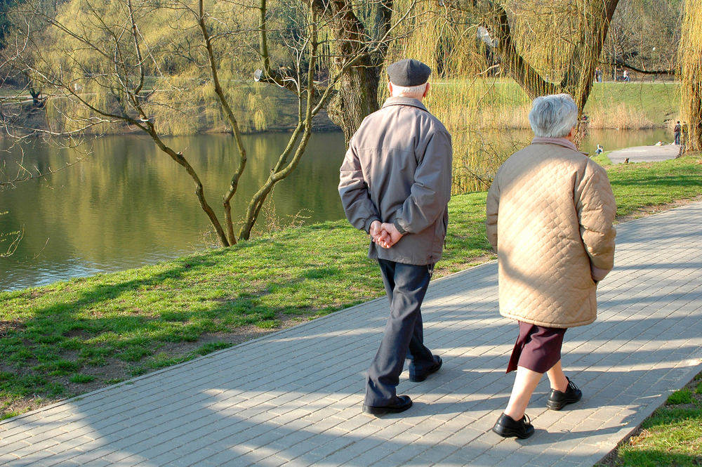 Couple Walking by River