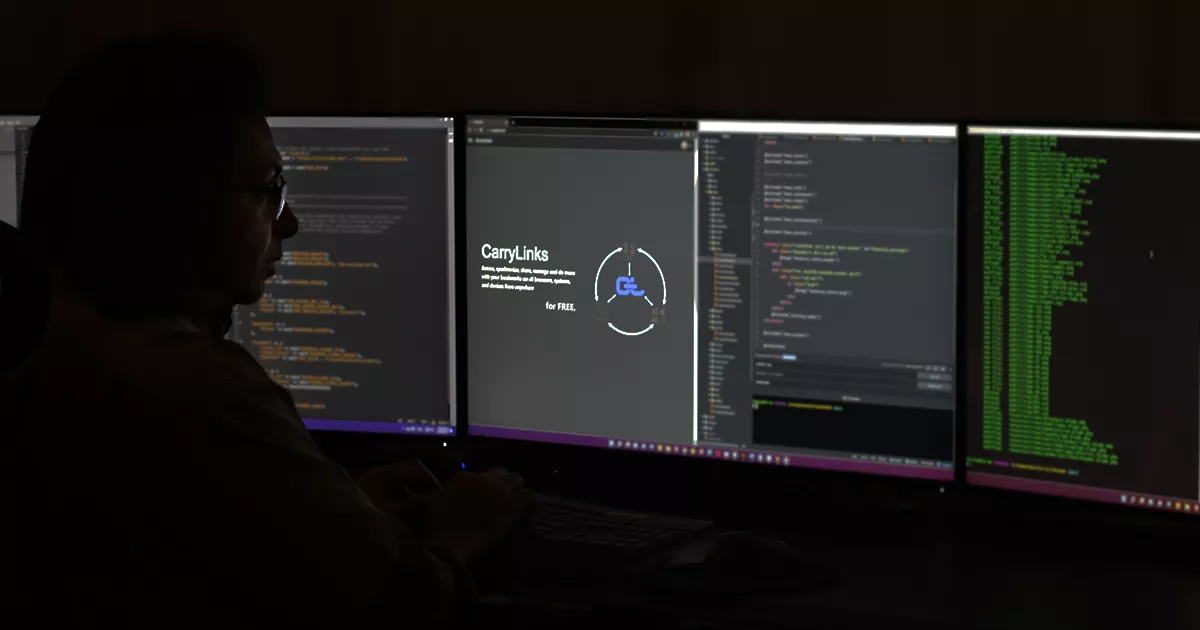 Khaled Huthaily working on the development of the bookmark manager CarryLinks on a desktop
