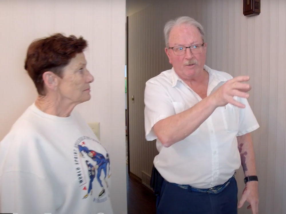 Technician consulting with homeowner during carpet cleaning assessment in Whitehall MT