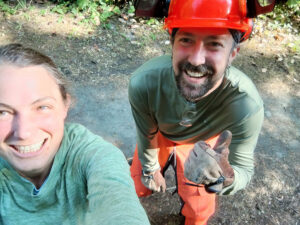 Selfie of woman and man in hard hat