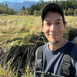 Selfie of man smiling in wetlands
