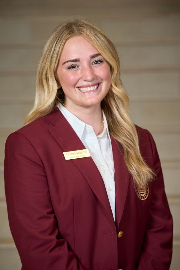 Maroon coat staff image