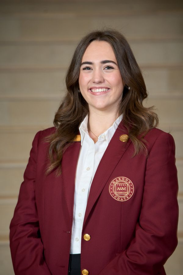 Maroon coat staff image