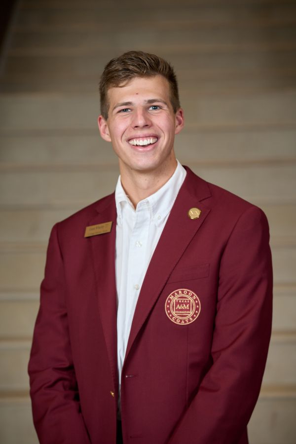 Maroon coat staff image