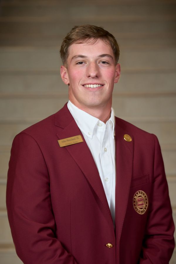 Maroon coat staff image