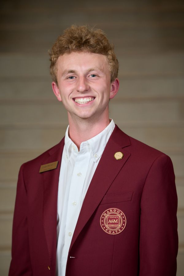Maroon coat staff image