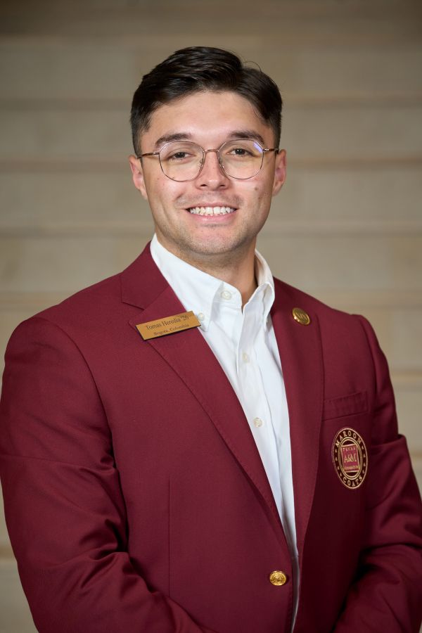 Maroon coat staff image