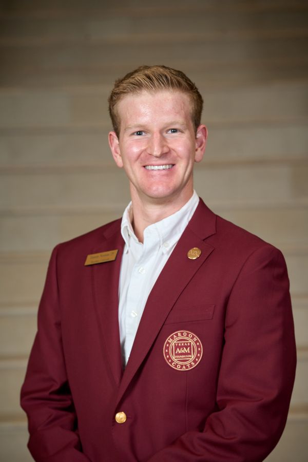 Maroon coat staff image