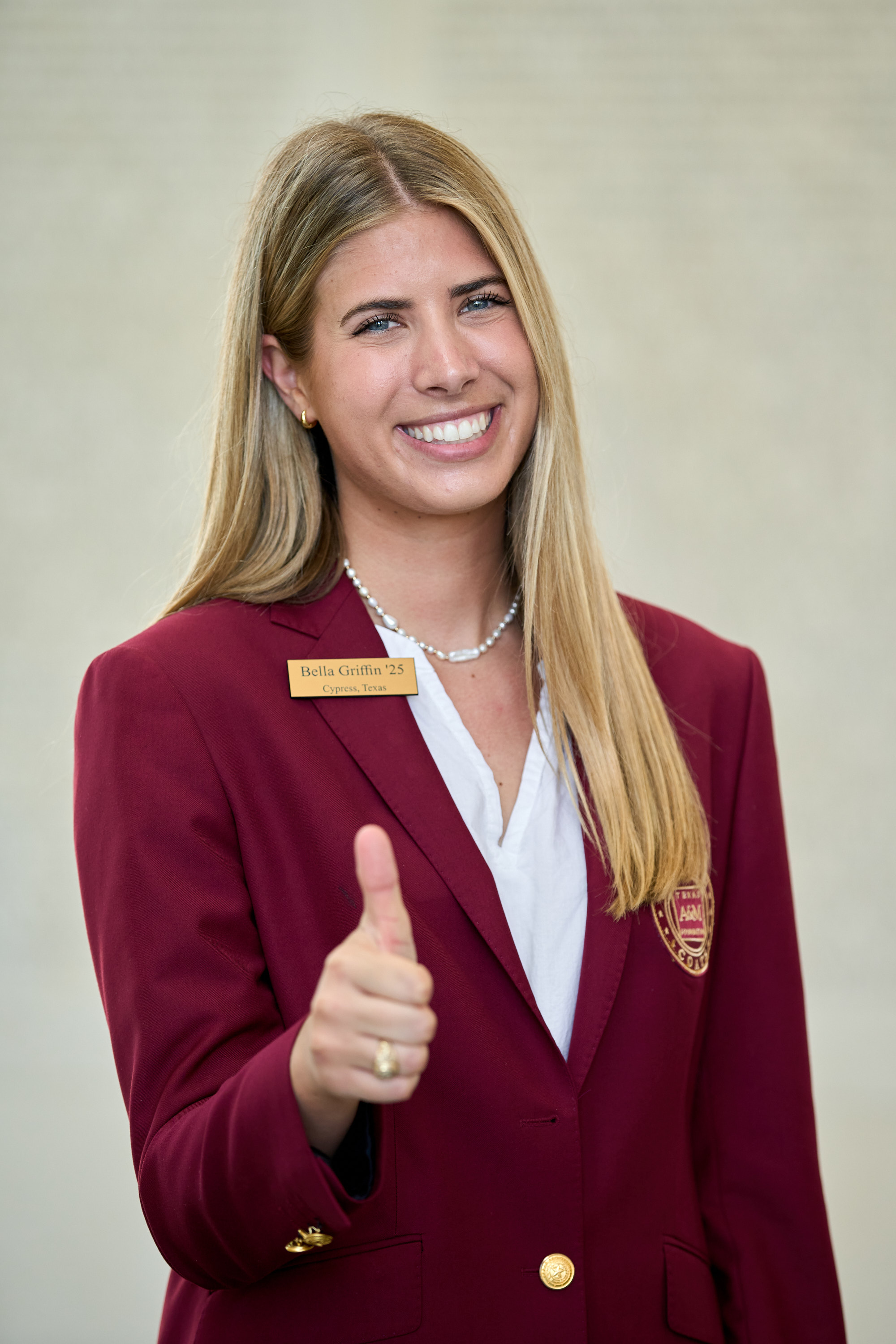 Maroon coat staff image