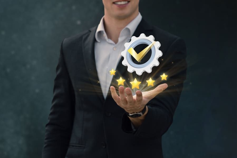 
Man holding a check sign with stars