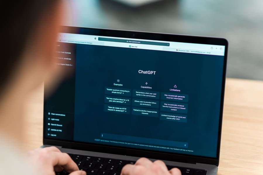 man typing a prompt on chatgpt