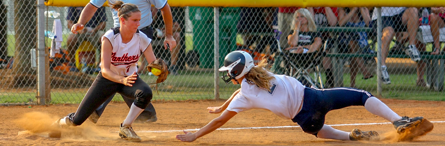 Girls playing softball