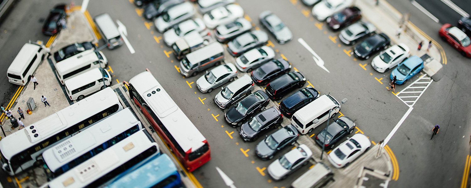 Parking Lot with Cars and Buses