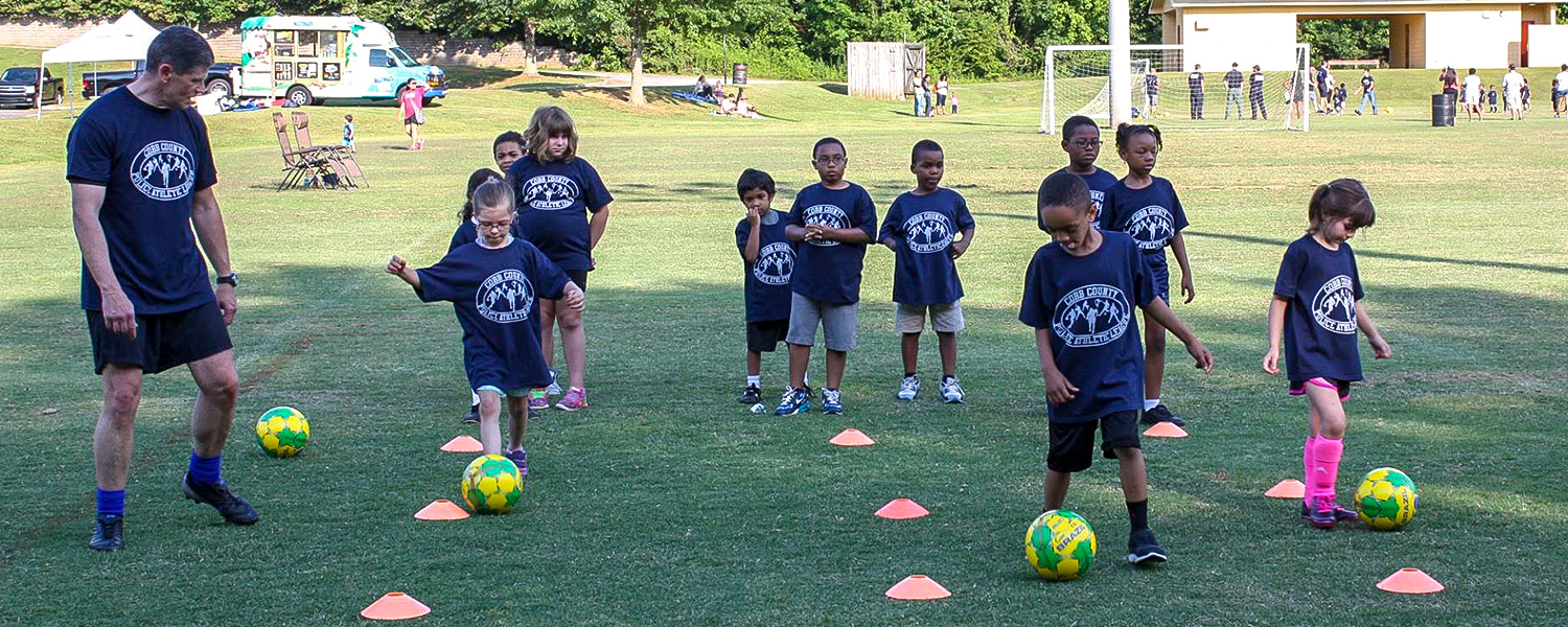 PAL Soccer Children with Officer