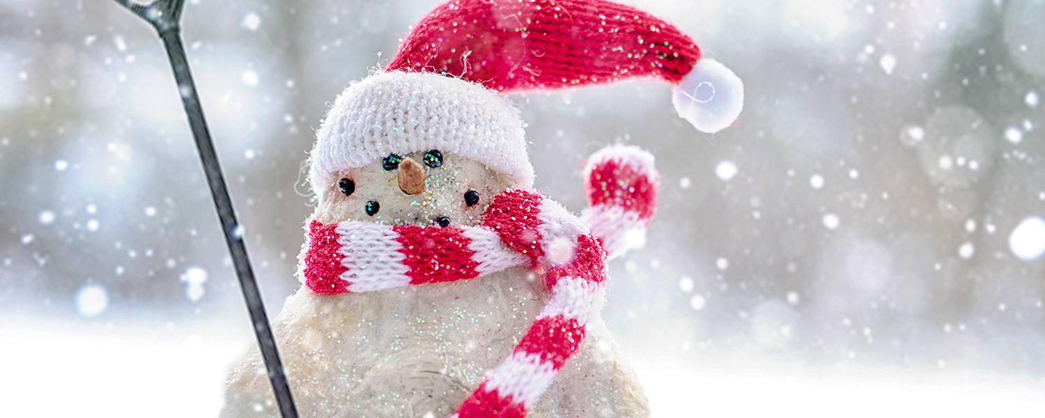 Snowman with Shovel and Holiday Hat