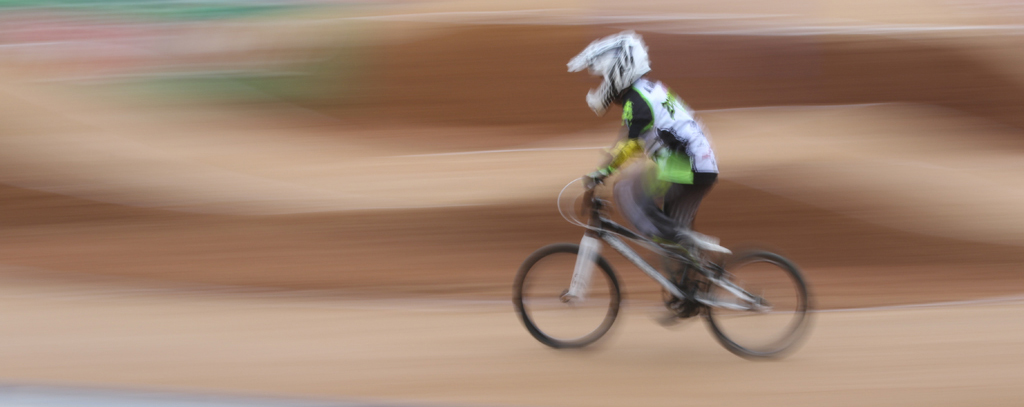 Photo of a bmx racer in action.