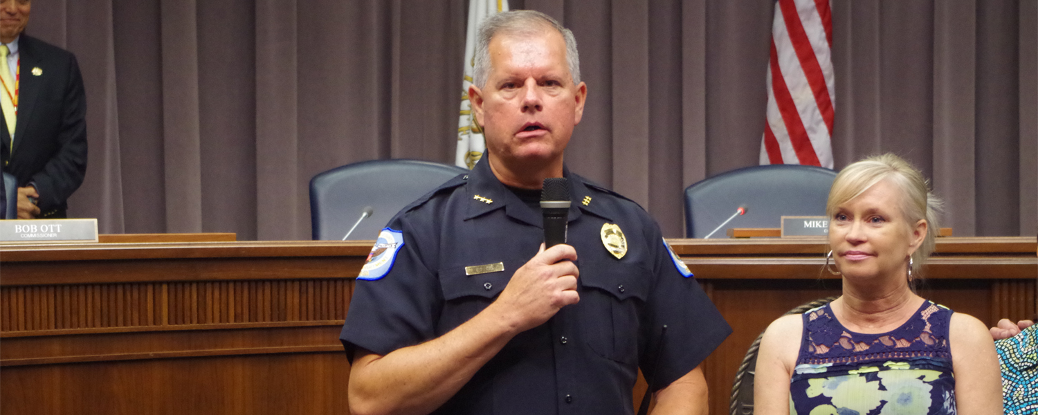 Tim Cox addresses the crowd at the Board of Commissioners meeting