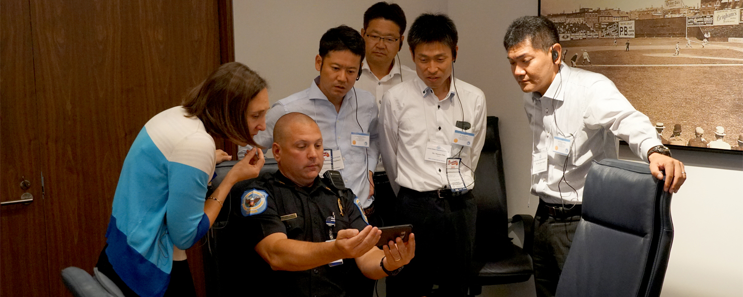 picture of japanese contigent with Cobb police officer