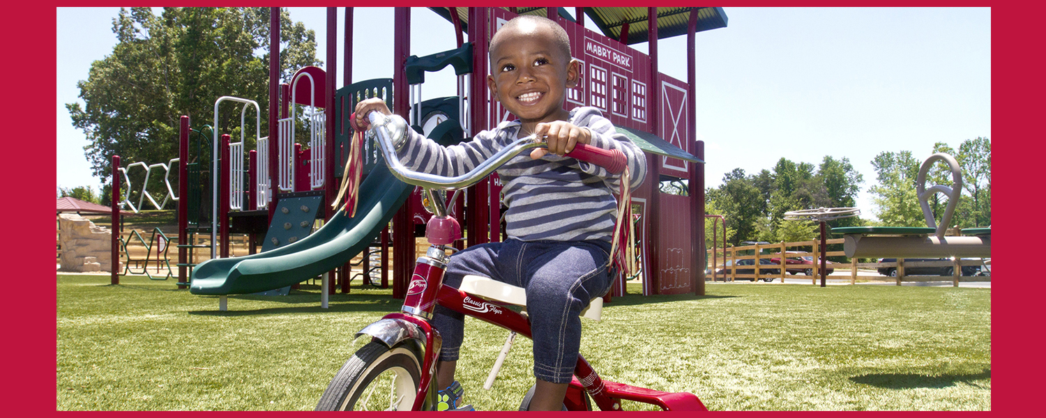 Boy on Tricycle