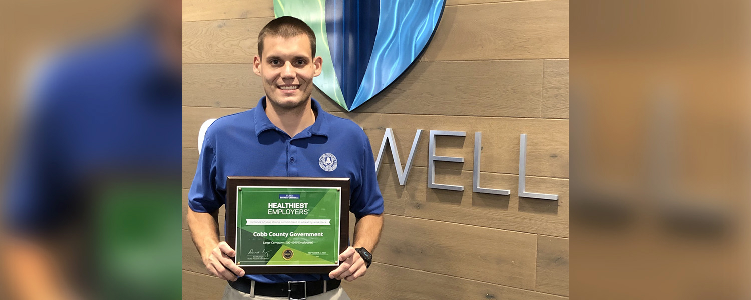 picture of keith mazonkey with award