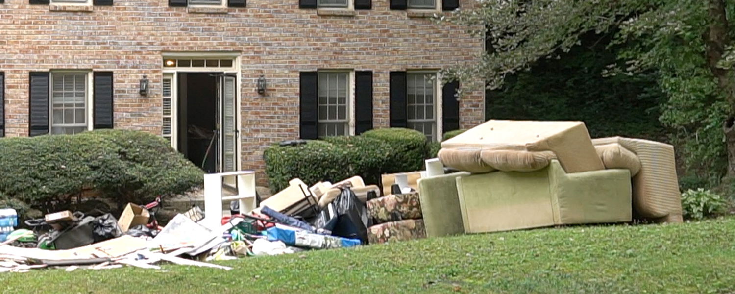 picture of storm damage outside a house
